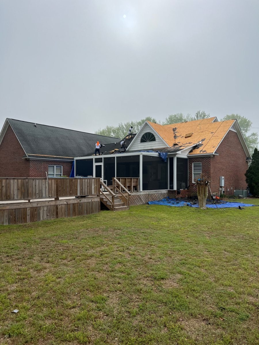 Brick home with a shingle roof